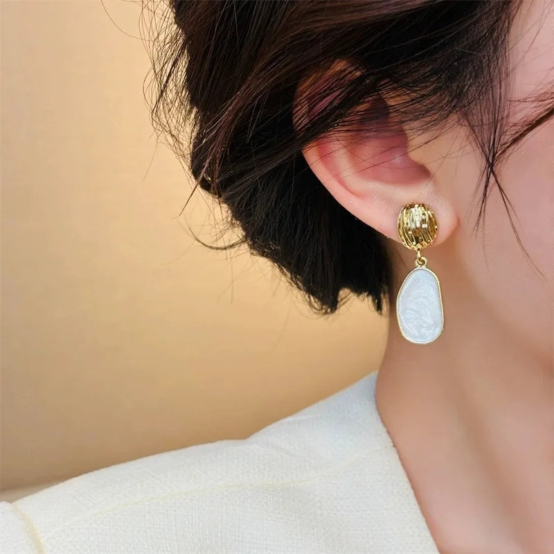 Artisan Oval Drop Earrings – White Enamel & Geometric Dangle Design